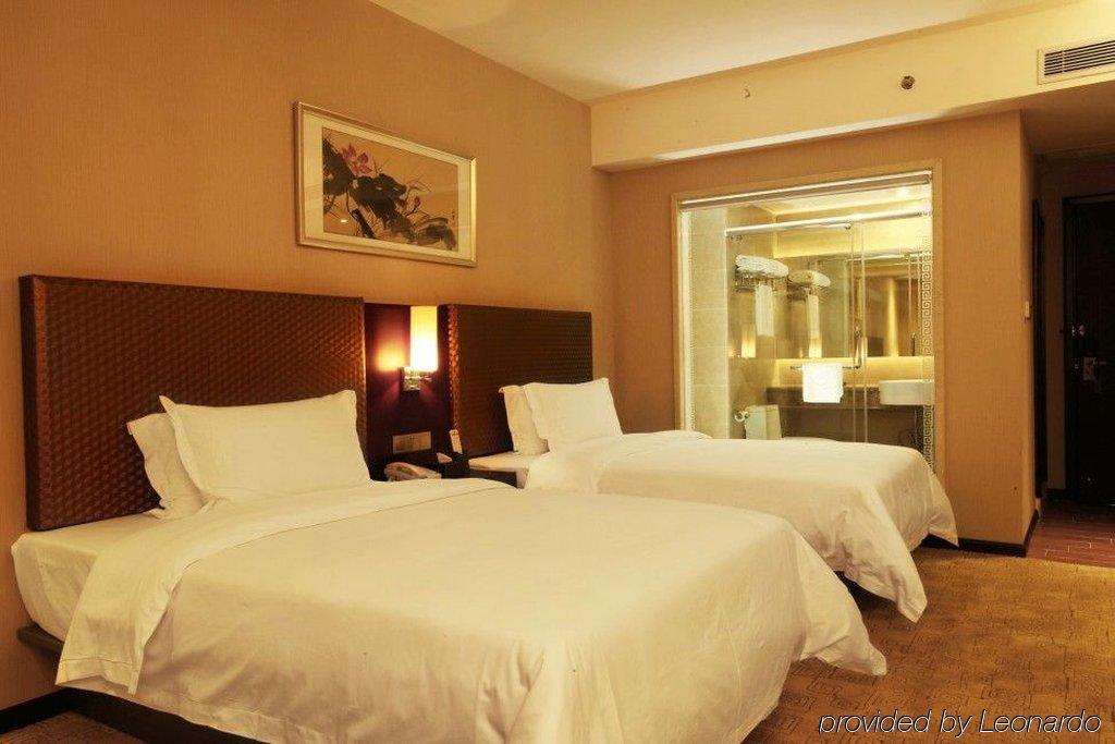 Oriental Shine Hotel Shenzhen Quarto foto