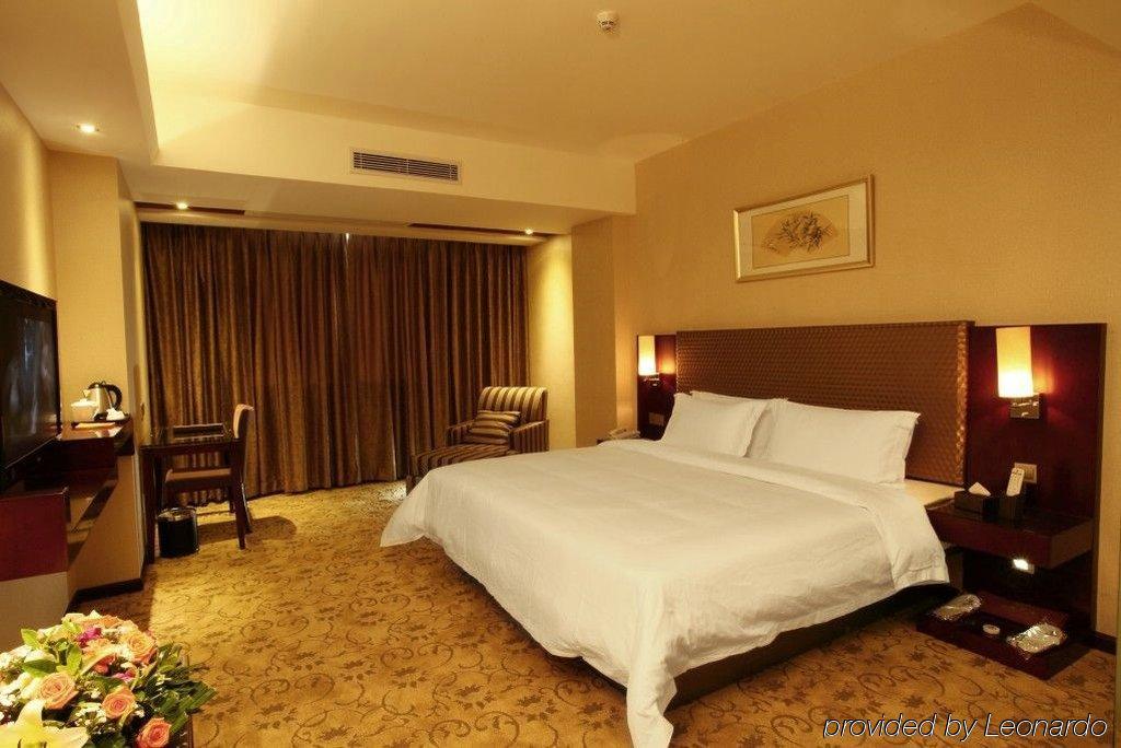 Oriental Shine Hotel Shenzhen Quarto foto